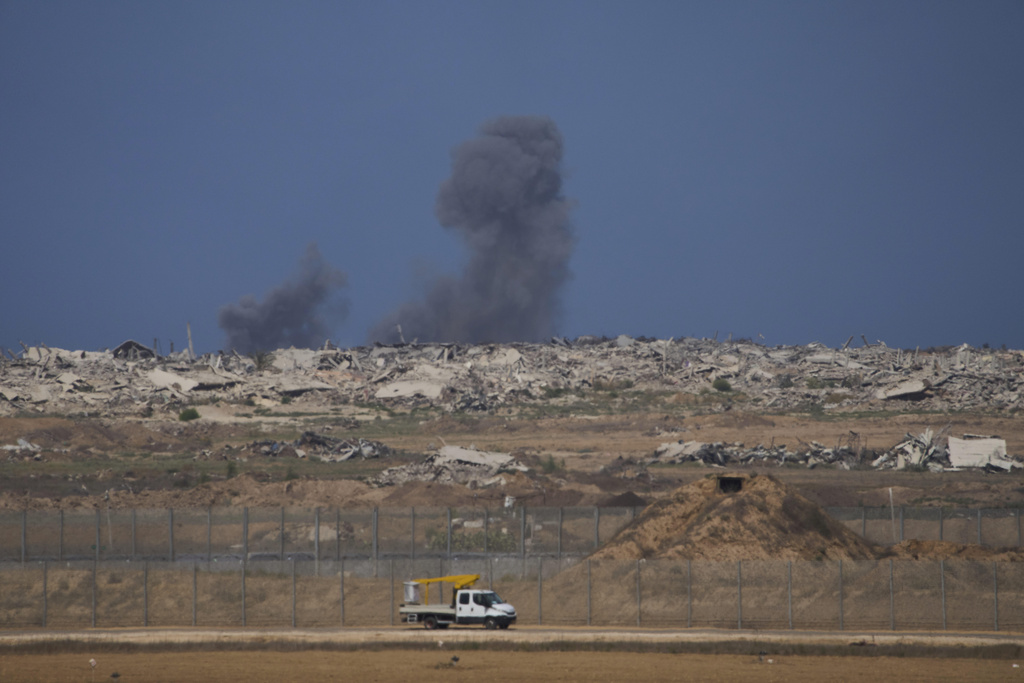 Smoke from an Israeli bombardment rises over the Gaza Strip, seen from southern Israel, Wednesday, Sept. 3, 2025. (AP Photo/Ariel Schalit)