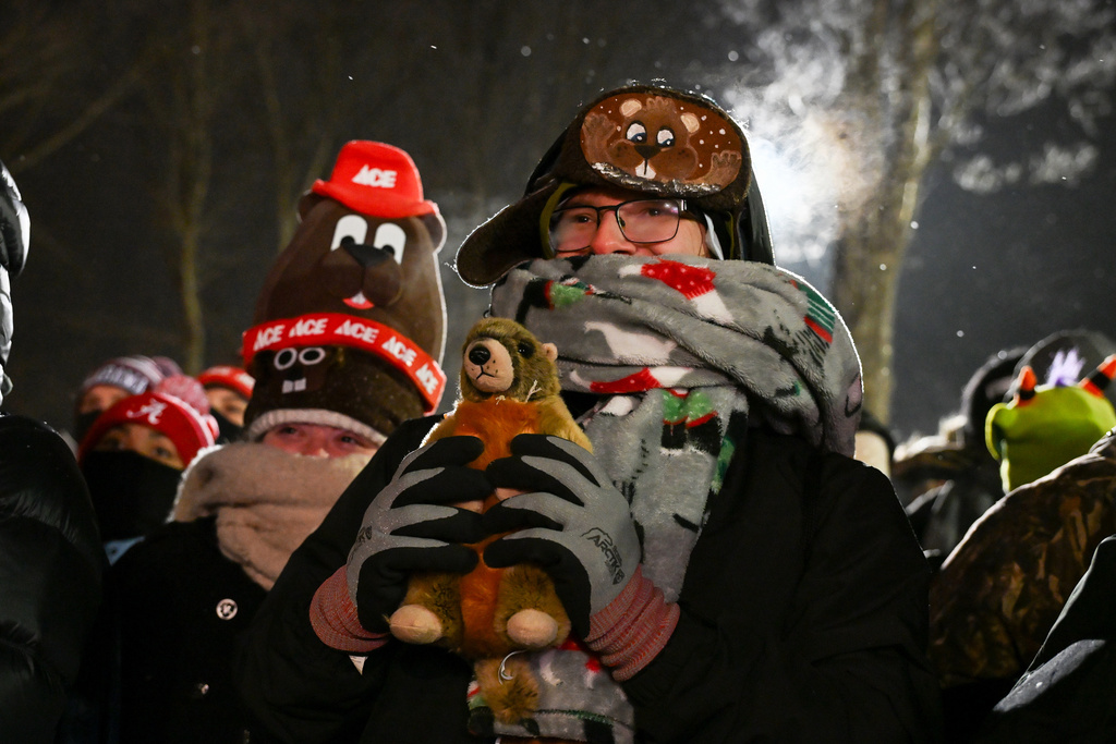 George Morar, of Youngstown, Ohio., celebrates while waiting for Punxsutawney Phil, the weather prognosticating groundhog, to come out and make his prediction during the 140th celebration of Groundhog Day on Gobbler's Knob in Punxsutawney, Pa., Monday, Feb. 2, 2026. (AP Photo/Barry Reeger)