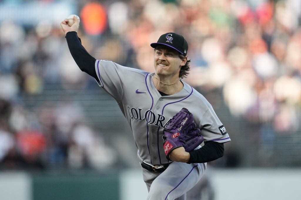 Colorado Rockies pitcher Ryan Feltner throws against the San Francisco Giants during the first inning of a baseball game Thursday, July 9, 2026, in San Francisco. (AP Photo/Jeff Chiu)