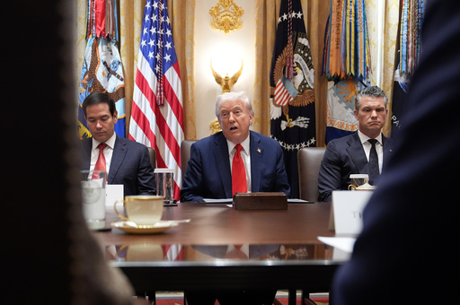 President Donald Trump speaks during a cabinet meeting at the White House, Thursday, Oct. 9, 2025, in Washington, as Secretary of State Marco Rubio, left, and Defense Secretary Pete Hegseth, right, look on. (AP Photo/Evan Vucci) President Donald Trump speaks during a cabinet meeting at the White House, Thursday, Oct. 9, 2025, in Washington, as Secretary of State Marco Rubio, left, and Defense Secretary Pete Hegseth, right, look on. (AP Photo/Evan Vucci)