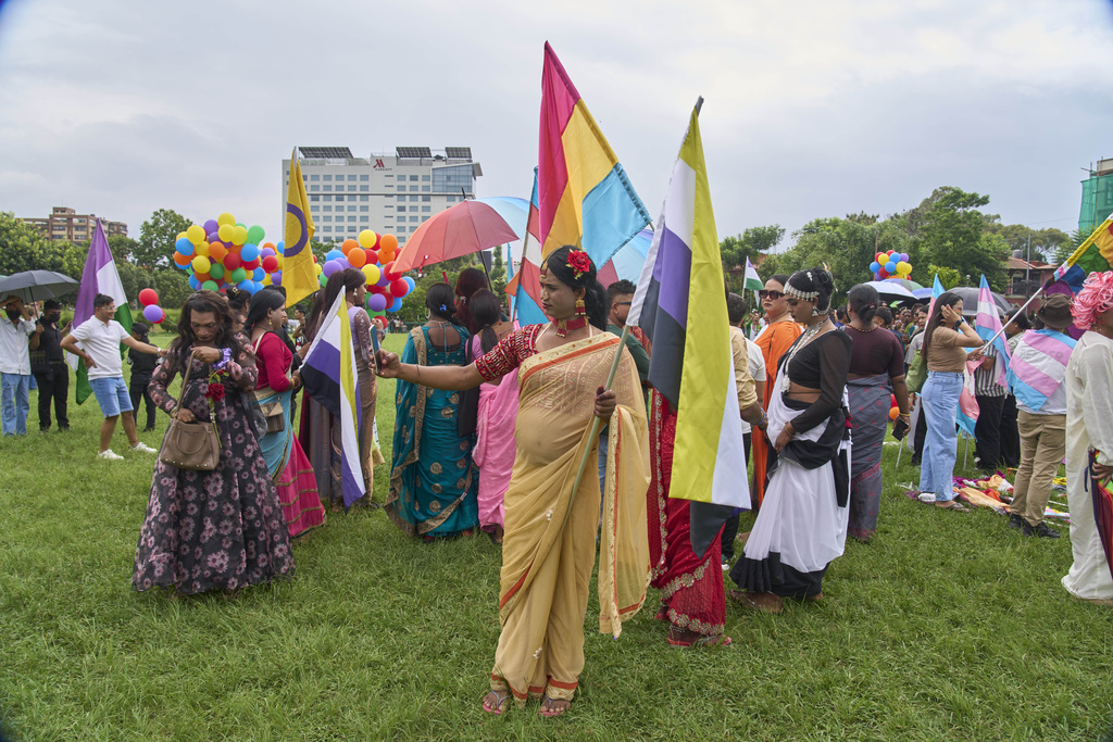Participants get ready to take part in the Pride Parade in Kathmandu, Nepal, Sunday, Aug. 10, 2025. (AP Photo/Niranjan Shrestha)