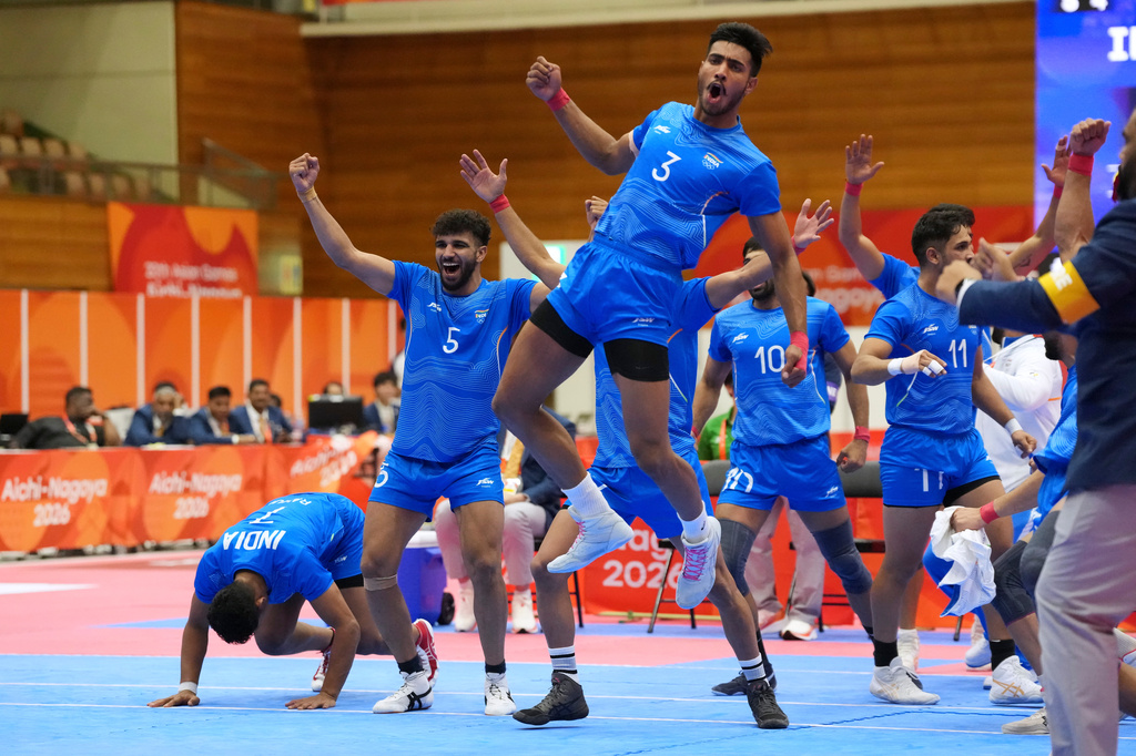Indian players celebrate after defeating Iran in the men's kabaddi final at the Asian Games in Tokai City, Japan, Saturday, Sept. 26, 2026. (AP Photo/Mark Baker)