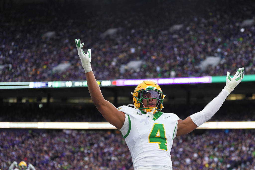 Oregon defensive back Brandon Finney reacts after breaking up a pass in the end zone against Washingtonduring the second half of an NCAA college football game, Saturday, Nov. 29, 2025, in Seattle. (AP Photo/Lindsey Wasson)