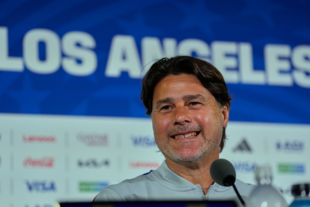 United States head coach Mauricio Pochettino smiles during a press conference ahead of his FIFA World Cup match against Paraguay at SoFi Stadium in Inglewood, Calif., Thursday, June 11, 2026. (AP Photo/Andre Penner)