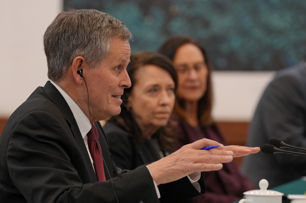 U.S. Senator Steve Daines, left, speaks next to his congressional delegation during a bilateral meeting with Chinese Foreign Minister Wang Yi at the Great Hall of the People, in Beijing, Thursday, May 7, 2026. (AP Photo/Andy Wong, Pool)