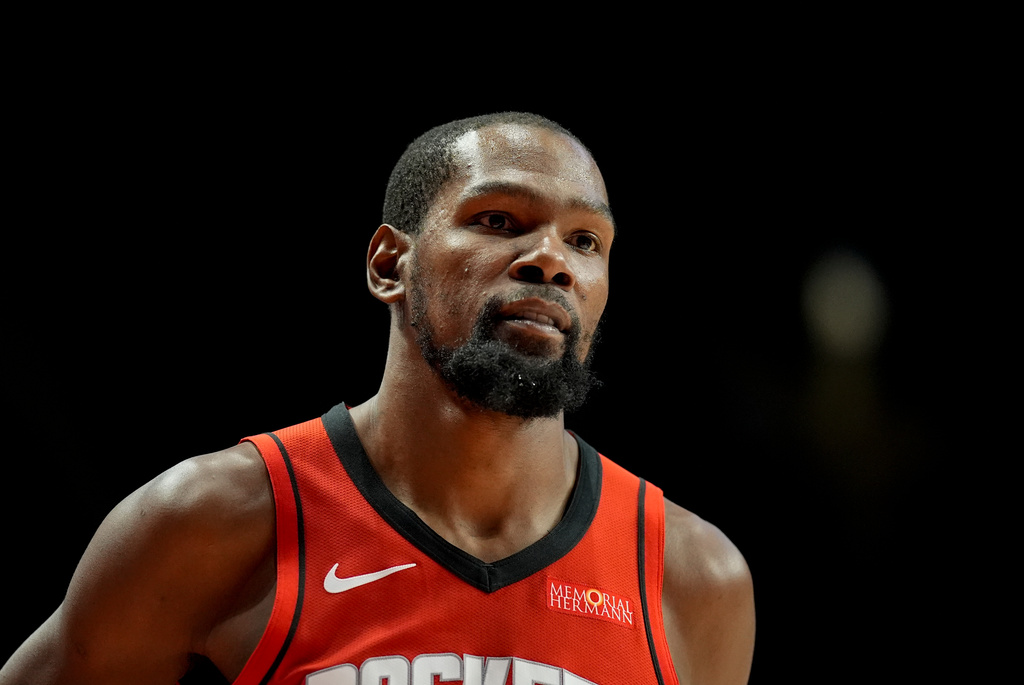 Houston Rockets forward Kevin Durant (7) moves on the court against the New Orleans Pelicans during the first half of an NBA preseason basketball game, Tuesday, Oct. 14, 2025, in Birmingham, Ala. (AP Photo/Mike Stewart)
