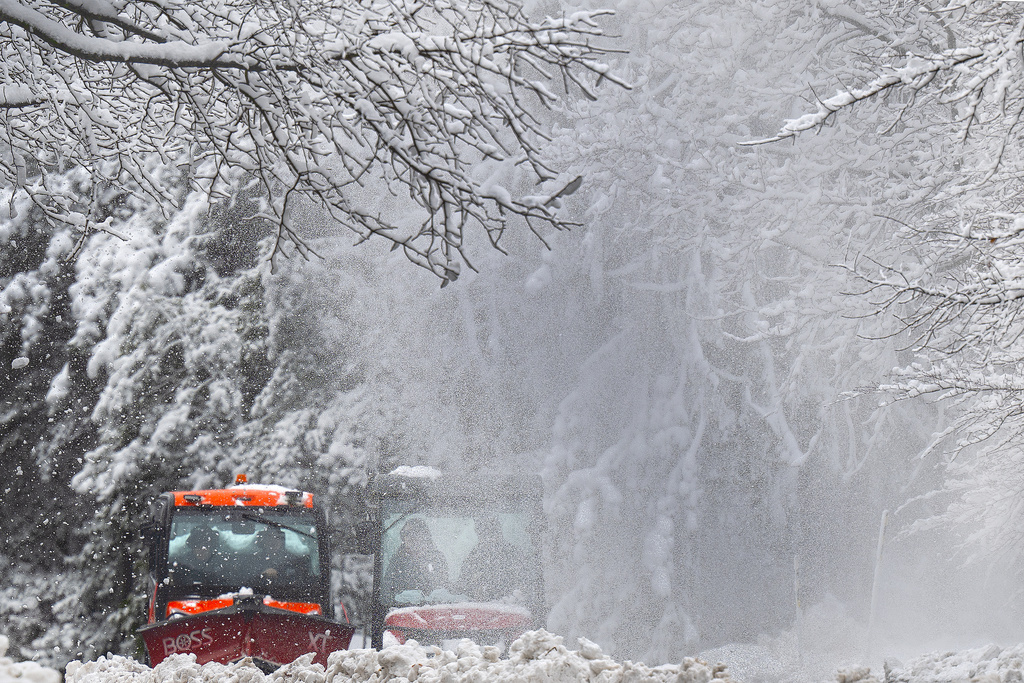 Snow removal vehicles plow through snow covered pathways at Swarthmore College in Swarthmore, Pa., Monday, Feb. 23, 2026. (Jose F. Moreno/The Philadelphia Inquirer via AP)
