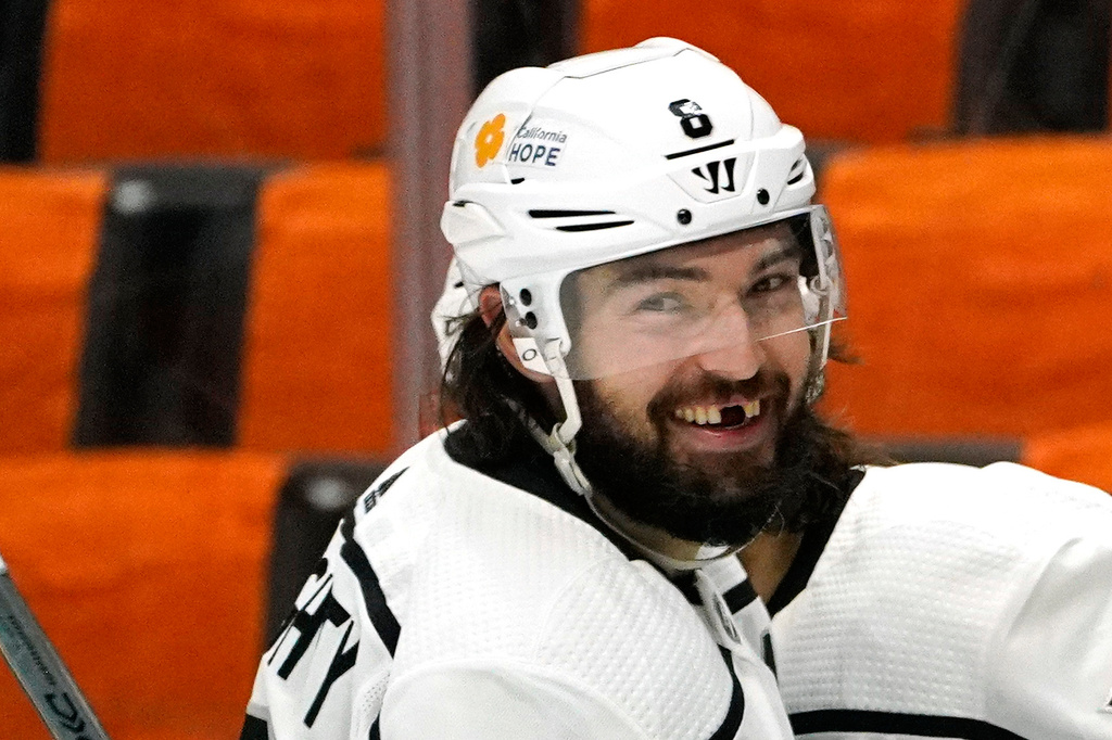 FILE - Los Angeles Kings defenseman Drew Doughty smiles after right wing Alex Iafallo scored during the third period of an NHL hockey game against the Anaheim Ducks Wednesday, March 10, 2021, in Anaheim, Calif. (AP Photo/Mark J. Terrill, File)