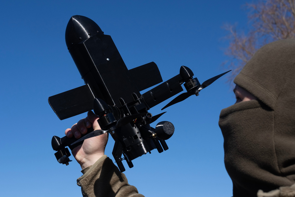 FILE - An instructor from the Ukrainian company General Cherry demonstrates the operation of an anti-air interceptor drone designed to destroy Russian attack drones in Kyiv region, on March 11, 2026. (AP Photo/Efrem Lukatsky, File)