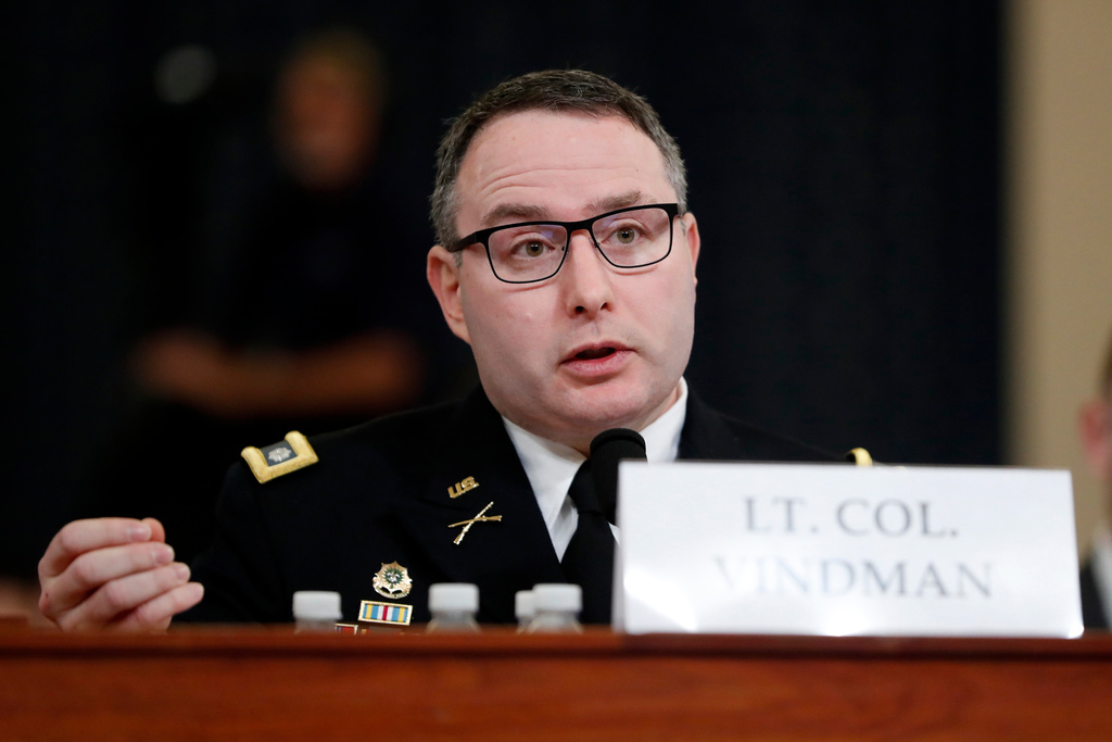 FILE - National Security Council aide Lt. Col. Alexander Vindman testifies before the House Intelligence Committee on Capitol Hill in Washington, Nov. 19, 2019, during a public impeachment hearing of President Donald Trump's efforts to tie U.S. aid for Ukraine to investigations of his political opponents. (AP Photo/Andrew Harnik, File)
