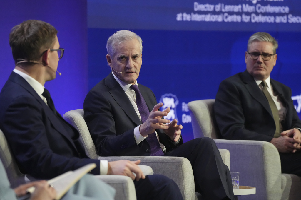 FILE - From left, Estonian Prime Minister Kristen Michal, Norwegian Prime Minister Jonas Gahr Store and British Prime Minister Keir Starmer attend a public discussion during the Joint Expeditionary Force Leaders' Summit in Tallinn, Estonia, on Dec. 16, 2024. (AP Photo/Sergei Grits, File)