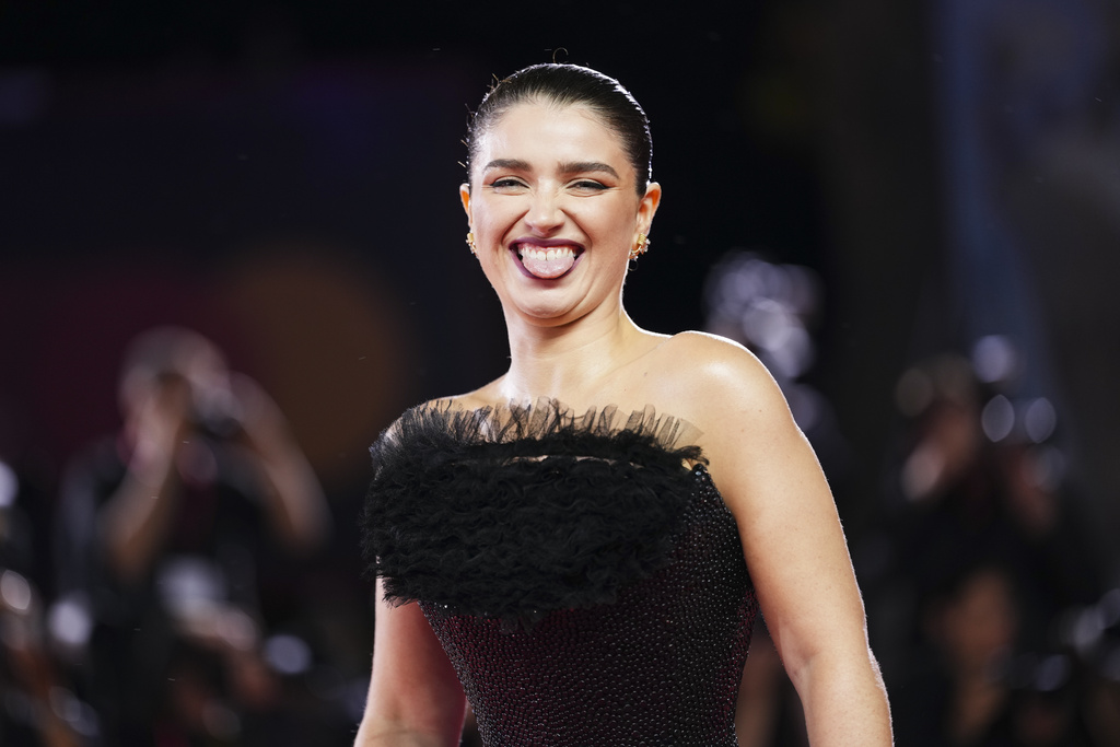 Eve Hewson poses for photographers at the red carpet for the film 'Jay Kelly' during the 82nd edition of the Venice Film Festival in Venice, Italy, on Thursday, Aug. 28, 2025. (Photo by Scott A Garfitt/Invision/AP)