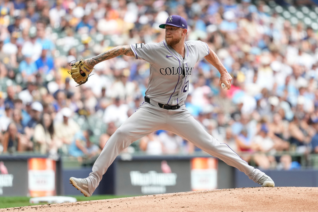 Colorado Rockies' Kyle Freeland pitches during the first inning of a baseball game against the Milwaukee Brewers, Sunday, July 26, 2026, in Milwaukee. (AP Photo/Aaron Gash)