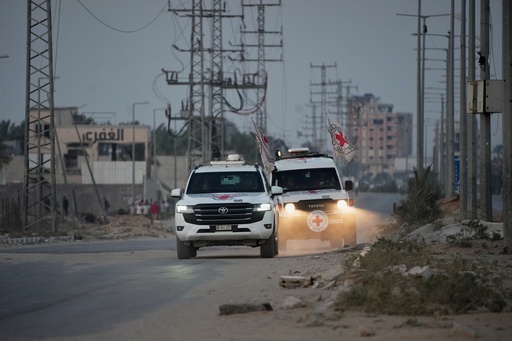Red Cross vehicles carrying the bodies of two people believed to be deceased hostages handed over by Hamas make their way toward the Kissufim border crossing with Israel, to be transferred to Israeli authorities, in Deir al-Balah, central Gaza Strip, Thursday, Oct. 30, 2025. (AP Photo/Abdel Kareem Hana) Red Cross vehicles carrying the bodies of two people believed to be deceased hostages handed over by Hamas make their way toward the Kissufim border crossing with Israel, to be transferred to Israeli authorities, in Deir al-Balah, central Gaza Strip, Thursday, Oct. 30, 2025. (AP Photo/Abdel Kareem Hana)