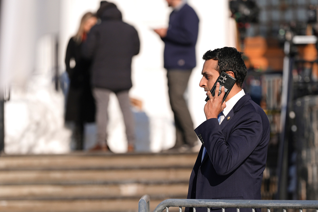 Rep. Suhas Subramanyam, D-Va., talks on his phone outside the Chappaqua Performing Arts Center where former President Bill Clinton was testifying before U.S. House lawmakers as part of a congressional investigation into convicted sex offender Jeffrey Epstein, Friday, Feb. 27, 2026, in Chappaqua, N.Y. (AP Photo/Angelina Katsanis)