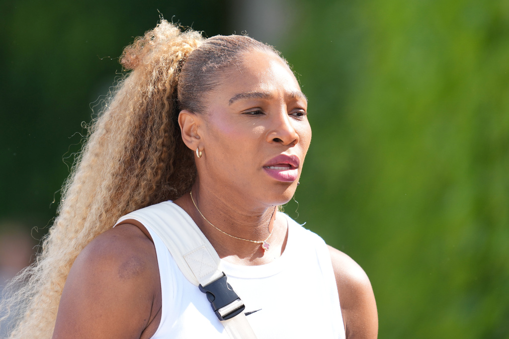 Serena Williams of the United States arrives to practice one day ahead of the start of the Wimbledon Tennis Championships in London, Sunday, June 28, 2026. (AP Photo/Kin Cheung)