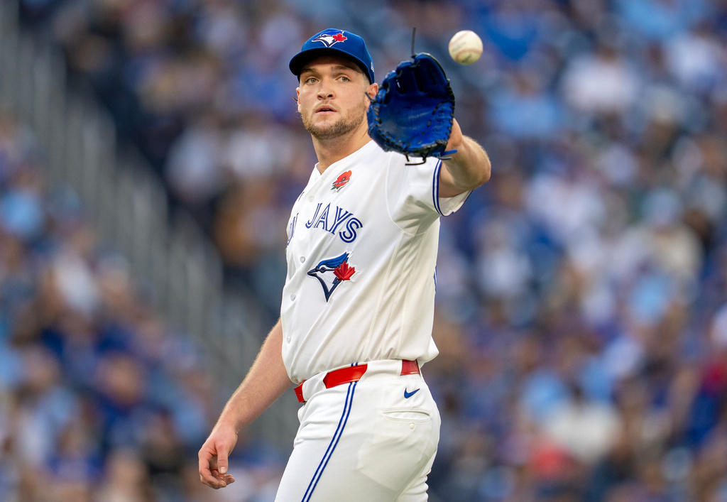 Toronto Blue Jays pitcher Trey Yesavage catches the ball during second-inning baseball game action against the Miami Marlins in Toronto, Monday May 25, 2026. (Frank Gunn/The Canadian Press via AP)