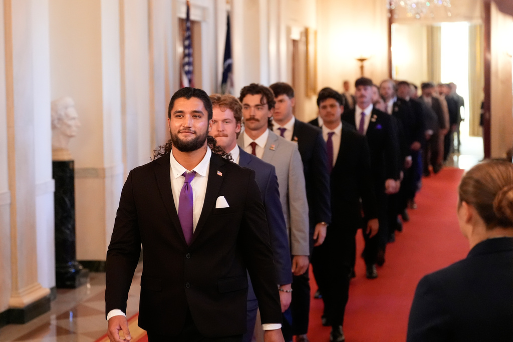 LSU-Shreveport arrives before President Donald Trump speaks during an event to welcome the 2025 LSU and LSU-Shreveport national champion baseball teams in the East Room of the White House, Monday, Oct. 20, 2025, in Washington. (AP Photo/Alex Brandon)
