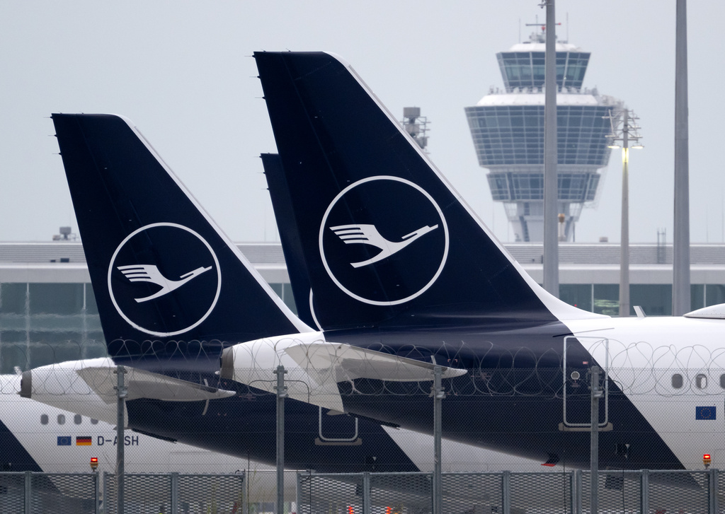 FILE - Lufthansa aircraft are parked on the apron at Munich Airport, in Munich, Germany, Friday, April 10, 2026. (Sven Hoppe/dpa via AP, File)