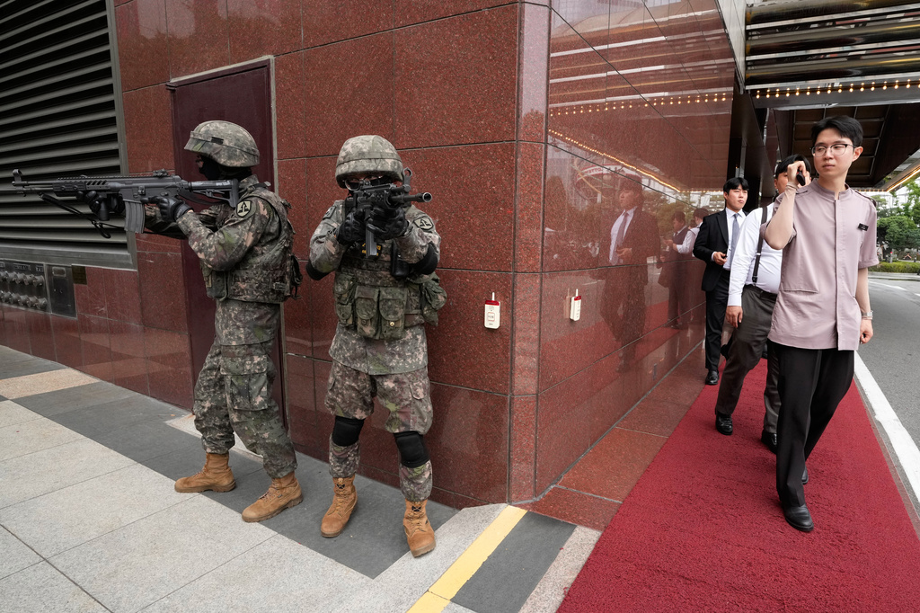 South Korea army soldiers take part in an anti-terror drill as a part of the Ulchi Freedom Shield military exercise between the U.S. and South Korea in Seoul, South Korea, Wednesday, Aug. 19, 2026. (AP Photo/Ahn Young-joon)