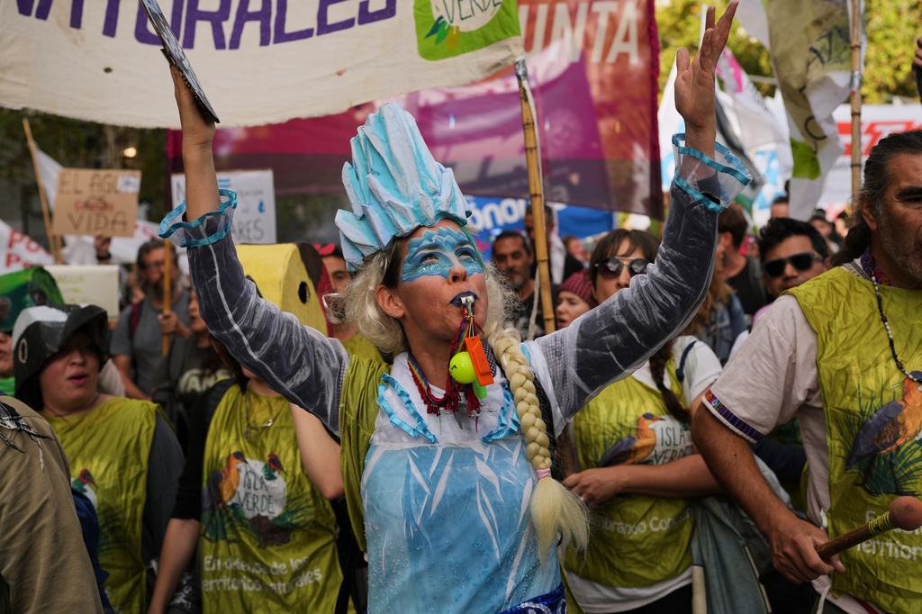 Demonstrators protest outside Congress as lawmakers debate the Javier Milei government's proposal to reform the glacier protection law in Buenos Aires, Argentina, Wednesday, April 8, 2026. (AP Photo/Rodrigo Abd)