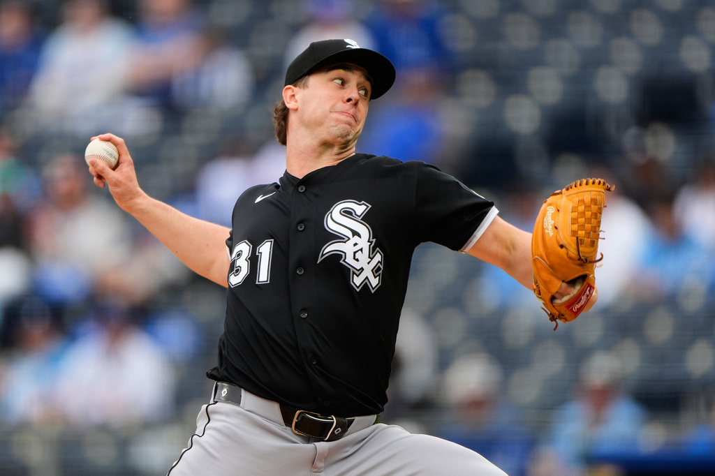 Chicago White Sox starting pitcher Grant Taylor throws during the first inning of a baseball game against the Chicago White Sox, Sunday, April 12, 2026, in Kansas City, Mo. (AP Photo/Charlie Riedel)