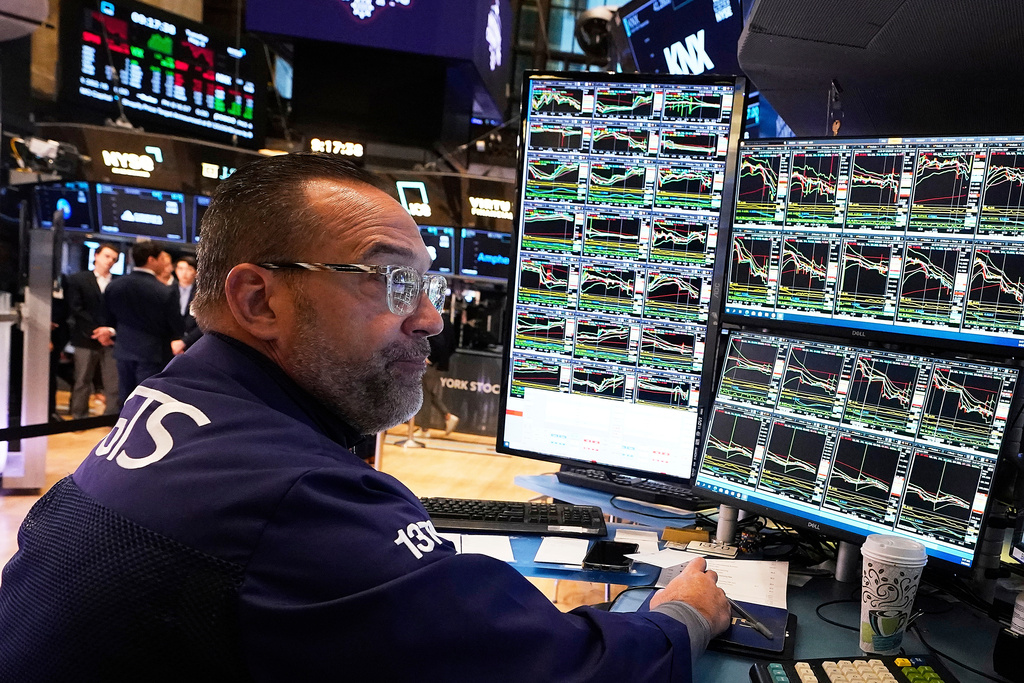 FILE - Specialist Anthony Matesic works on the floor of the New York Stock Exchange, Tuesday, May 6, 2025. (AP Photo/Richard Drew, File)