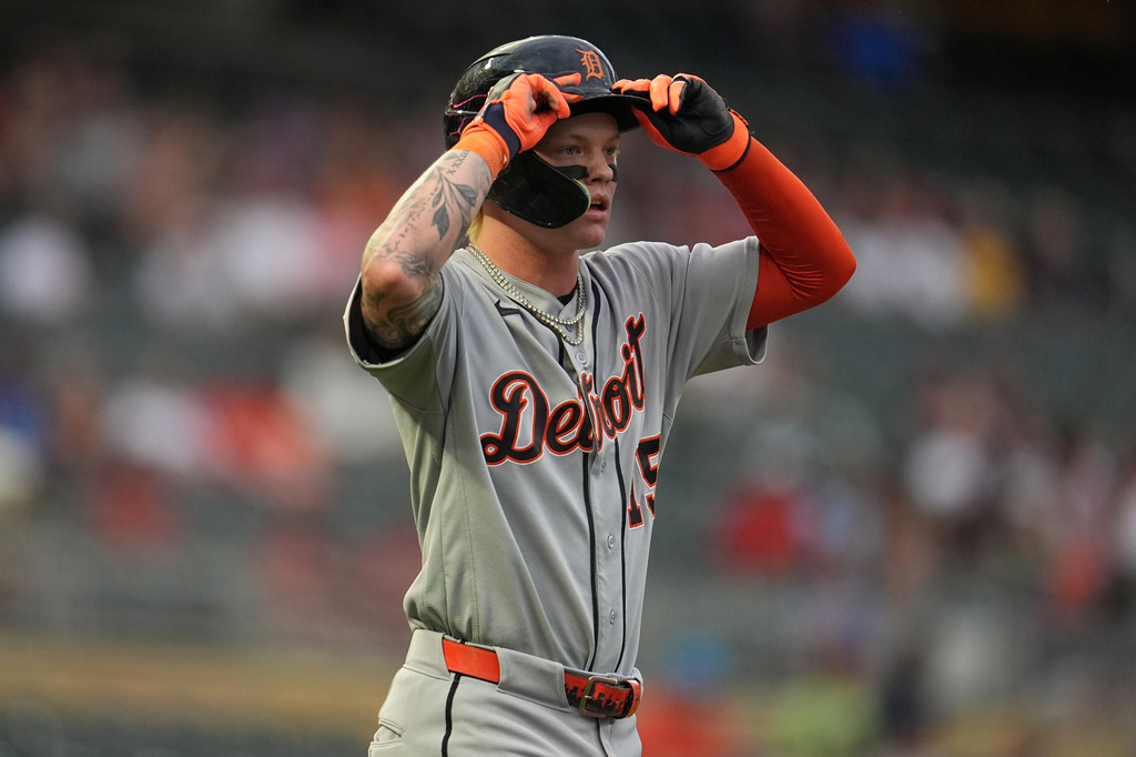 Detroit Tigers' Max Clark walks to first base after being hit by a pitch during the second inning of a baseball game against the Minnesota Twins Tuesday, Sept. 1, 2026, in Minneapolis. (AP Photo/Abbie Parr)