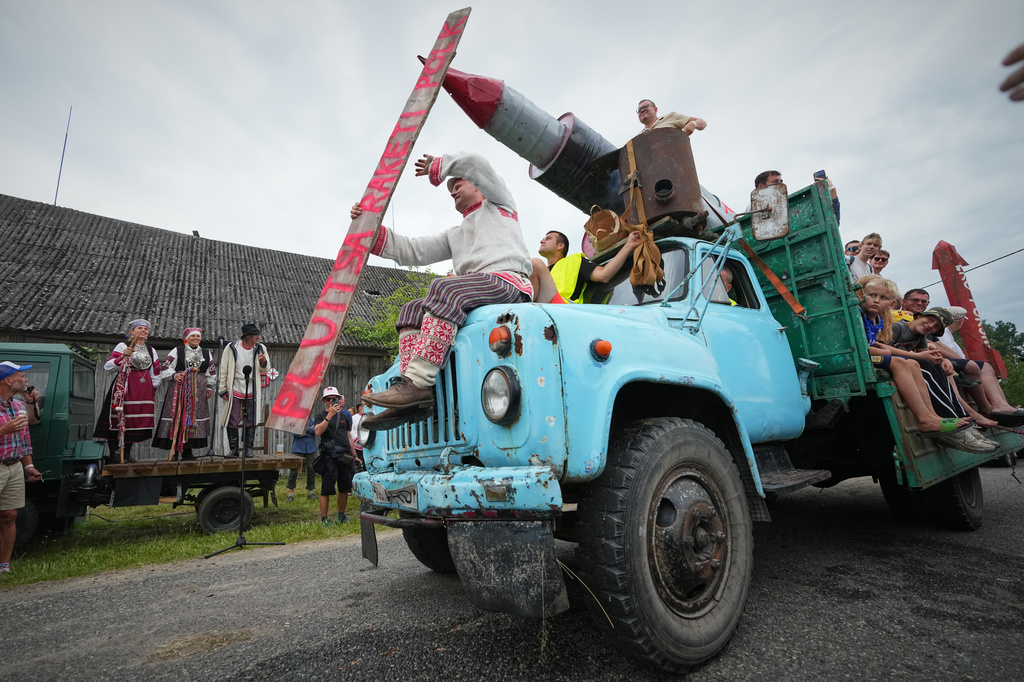 Estonia Seto Kingdom Day People attend mock military parade during the annual Seto Kingdom Day in Mikitamäe, south Estonia, Saturday, Aug. 1, 2026. (AP Photo/Sergei Grits)