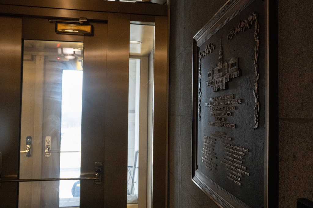 A plaque honoring police service on Jan. 6, 2021 at the Capitol, Saturday, March 7, 2026, in Washington. (AP Photo/Allison Robbert)