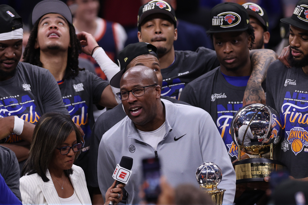 New York Knicks head coach Mike Brown is interview after winning Game 4 in the Eastern Conference finals NBA basketball playoffs series against the Cleveland Cavaliers in Cleveland, Monday, May 25, 2026. (AP Photo/Tim Phillis)