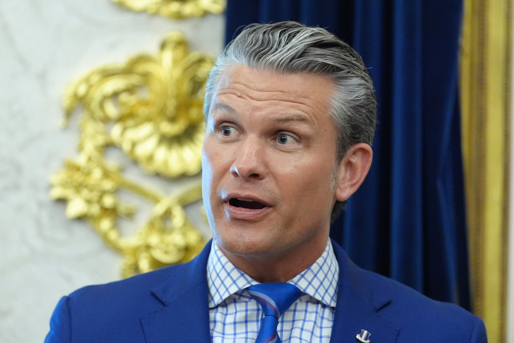 Defense Secretary Pete Hegseth speaks in the Oval Office of the White House during an executive order signing about quantum computing with President Donald Trump, Monday, June 22, 2026, in Washington. (AP Photo/Jacquelyn Martin)