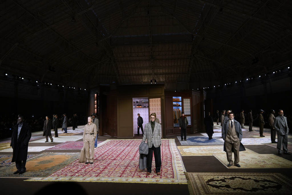 Models wear creations as part of the Ermenegildo Zegna Fall/Winter 2026-2027 Men's collection presented in Milan, Italy, Friday, Jan. 16, 2026. (AP Photo/Antonio Calanni)