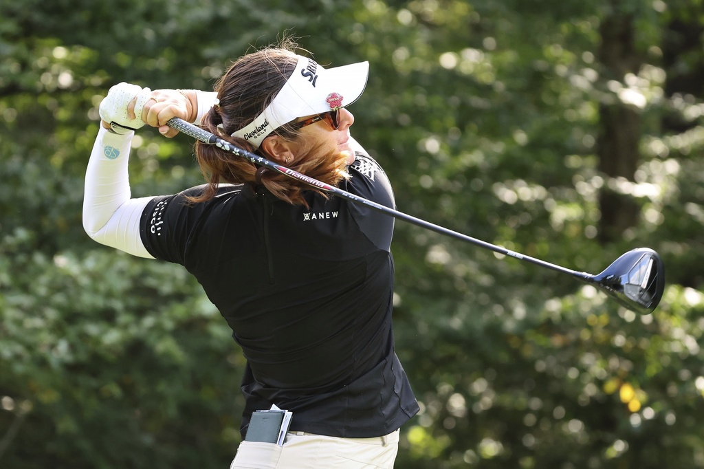Hannah Green, of Australia, tees off on the ninth hole during the first round of the FM Championship LPGA golf tournament at TPC Boston, Thursday, Aug. 28, 2025, in Norton, Mass. (AP Photo/Michael Dwyer)