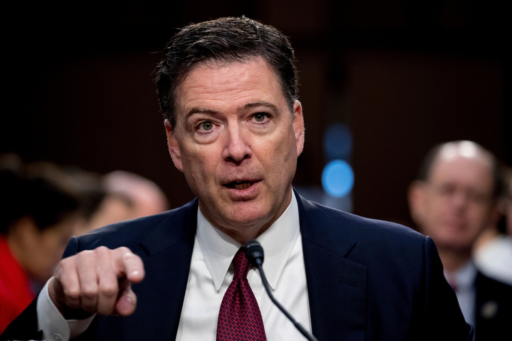 FILE - Former FBI director James Comey speaks during a Senate Intelligence Committee hearing on Capitol Hill, in Washington, June 8, 2017. (AP Photo/Andrew Harnik, File)