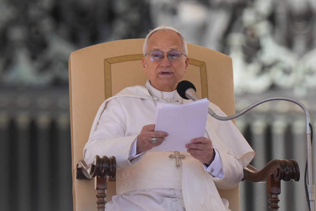 Pope Leo XIV delivers his speech during his weekly general audience in St. Peter's Square, at the Vatican, Wednesday, March 18, 2026. (AP Photo/Andrew Medichini)