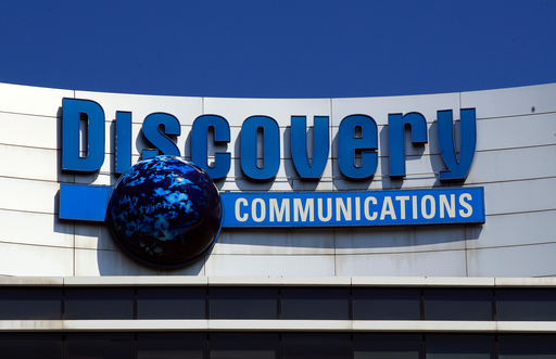 FILE - The Discovery Communications logo atop its headquarters in Silver Spring, Md, July 31, 2017. (AP Photo/Manuel Balce Ceneta, File) FILE - The Discovery Communications logo atop its headquarters in Silver Spring, Md, July 31, 2017. (AP Photo/Manuel Balce Ceneta, File)
