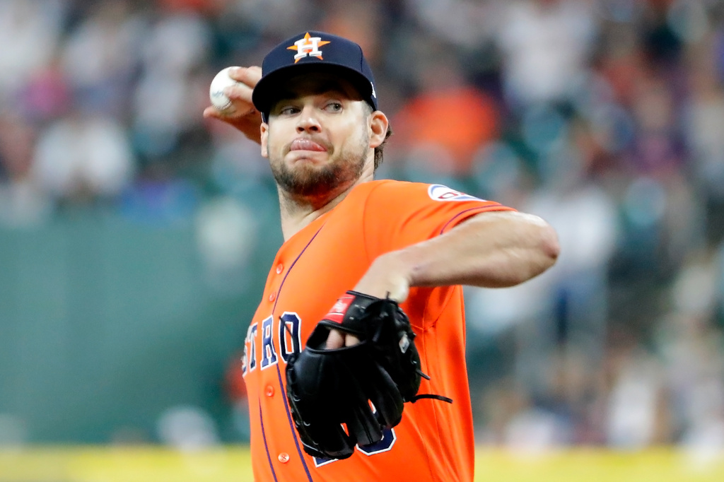Houston Astros starting pitcher Peter Lambert throws against the Athletics during the first inning of a baseball game Friday, June 5, 2026, in Houston. (AP Photo/Michael Wyke)