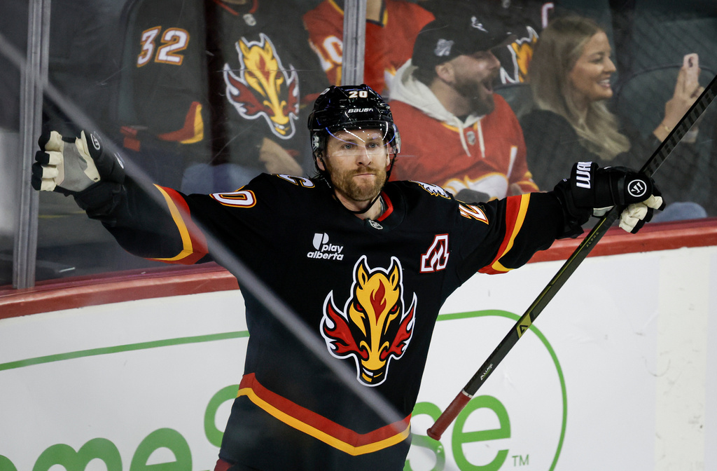 Calgary Flames' Blake Coleman celebrates his goal during the third period of an NHL hockey game against the Carolina Hurricanes in Calgary, Alberta, on Saturday, March 7, 2026. (Jeff McIntosh/The Canadian Press via AP)