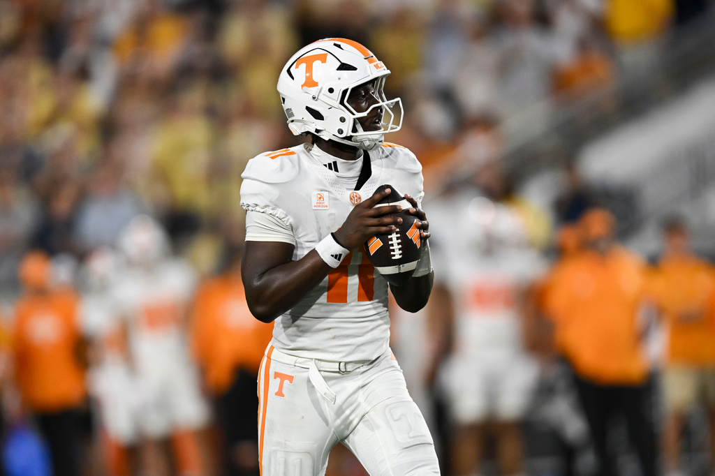 Tennessee quarterback Faizon Brandon (11) drops back for pass against Georgia Tech during the first half of an NCAA college football game against, Saturday, Sept. 12, 2026, in Atlanta. (AP Photo/Daniel Varnado)