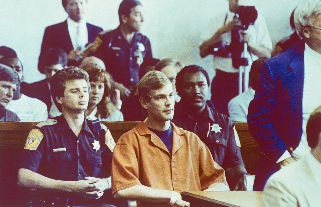 FILE - Suspected serial killer Jeffrey L. Dahmer sits in court for a hearing where he was charged with eight additional counts of first degree intentional homicide, bringing the total to 12, Aug. 7, 1991. (AP Photo/Jack Orton/Pool, File)