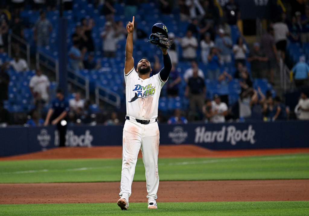 Tampa Bay Rays' Junior Caminero celebrates after they beat the Minnesota Twins during a baseball game Friday, April 24, 2026, in St. Petersburg, Fla. (AP Photo/Jason Behnken)