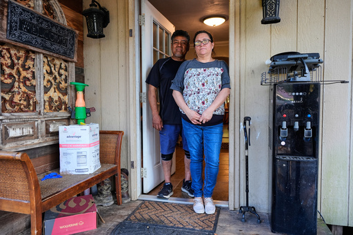 Celia Monreal and her husband Jorge, left, pose for a photo at her in the entry way of their home Wednesday, Oct. 8, 2025, in Tyler, Texas. (AP Photo/Tony Gutierrez) Celia Monreal and her husband Jorge, left, pose for a photo at her in the entry way of their home Wednesday, Oct. 8, 2025, in Tyler, Texas. (AP Photo/Tony Gutierrez)