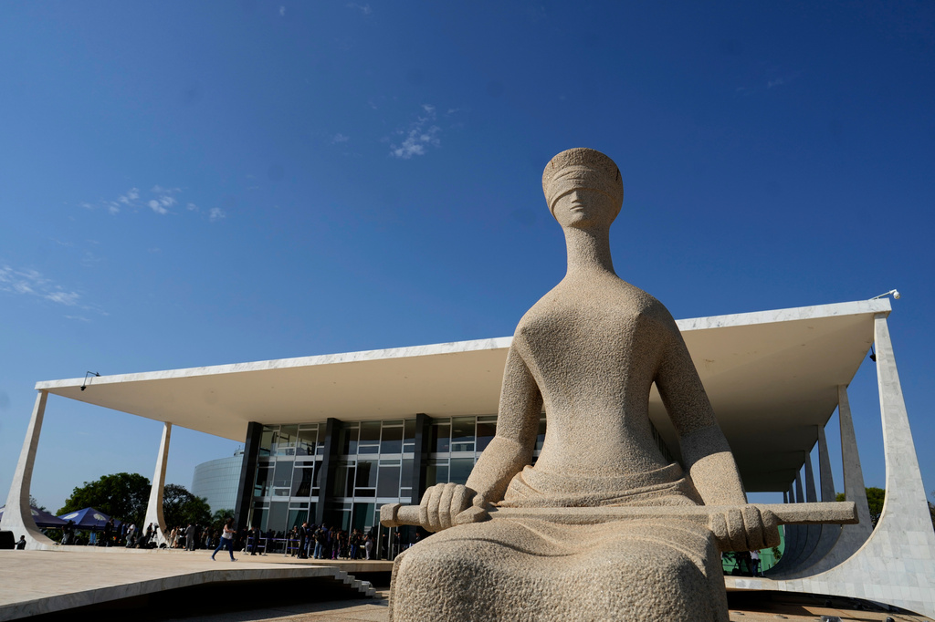The Justice statue sits outside Brazil's Supreme Court as justices attend a plenary session in Brasilia, Brazil, Tuesday, Sept. 15, 2026. (AP Photo/Eraldo Peres)