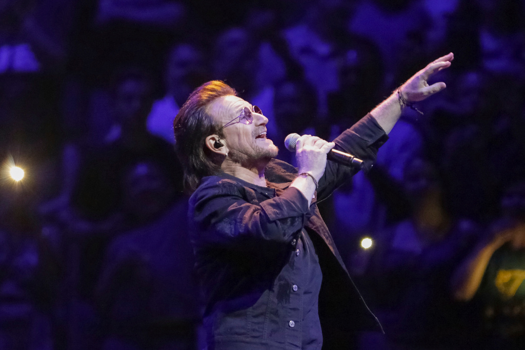 FILE - Singer Bono, of the band U2, performs in Washington on June, 17, 2018. (Photo by Brent N. Clarke/Invision/AP, File)
