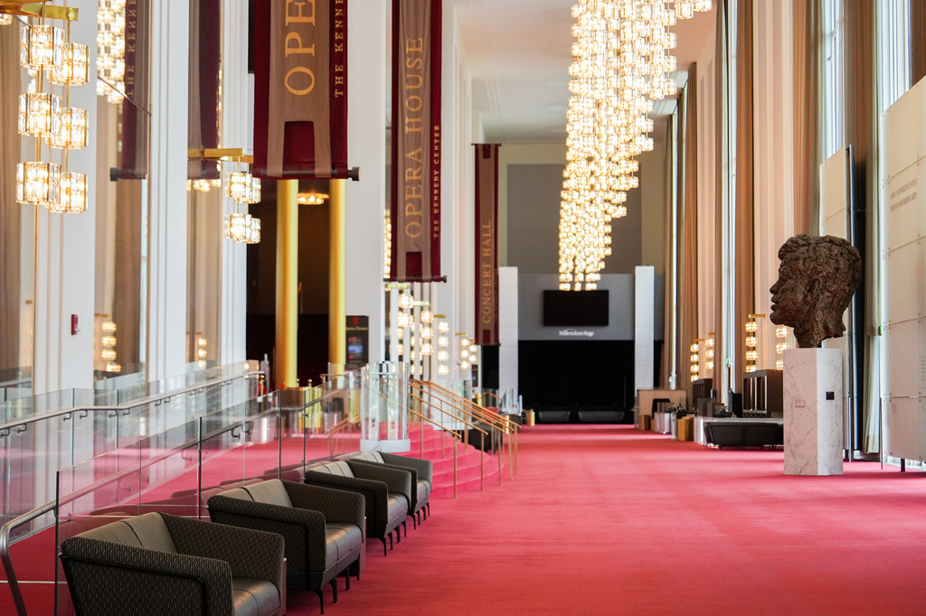 An eight foot tall bronze bust of President John F. Kennedy is seen in the Grand Foyer of the John F. Kennedy Center for the Performing Arts during a media tour to show building damage, Wednesday, April 22, 2026, in Washington. (AP Photo/Julia Demaree Nikhinson)