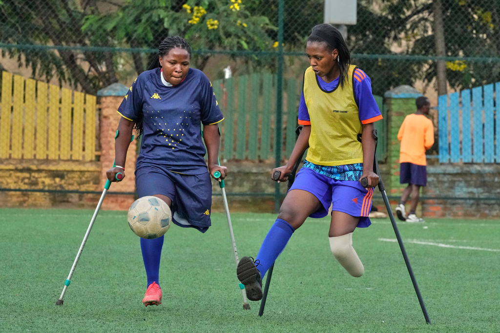 Soccer players on the Rwanda Amputee team play in Kigali, Rwanda, on Friday, March 20, 2026. (AP Photo/Brian Inganga)