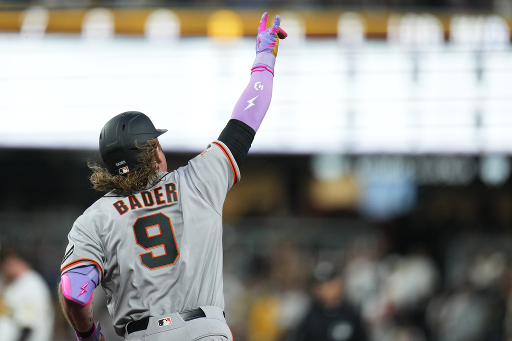 San Francisco Giants' Harrison Bader celebrates his home run during the third inning of a baseball game against the San Diego Padres Monday, March 30, 2026, in San Diego. (AP Photo/Gregory Bull)