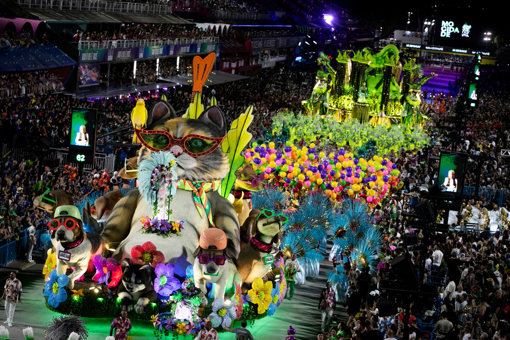 Performers from the Mocidade samba school parade on a float during Carnival celebrations at the Sambadrome in Rio de Janeiro, Monday, Feb. 16, 2026. (AP Photo/Bruna Prado)