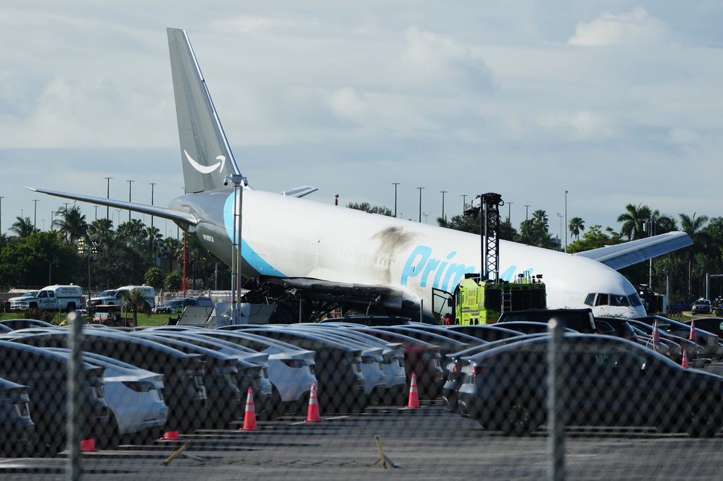 An Amazon cargo plane sits at the Miami International Airport (MIA) Monday, Sept. 7, 2026, after it overshot the runway on Sunday, in Miami. (AP Photo/Lynne Sladky)